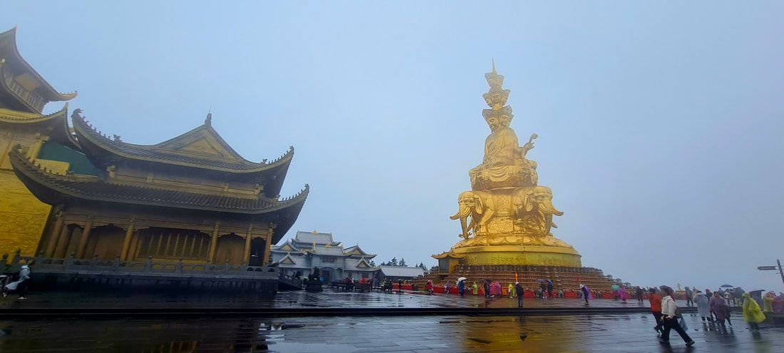 The Golden Peak Temple and White Elephant Statue